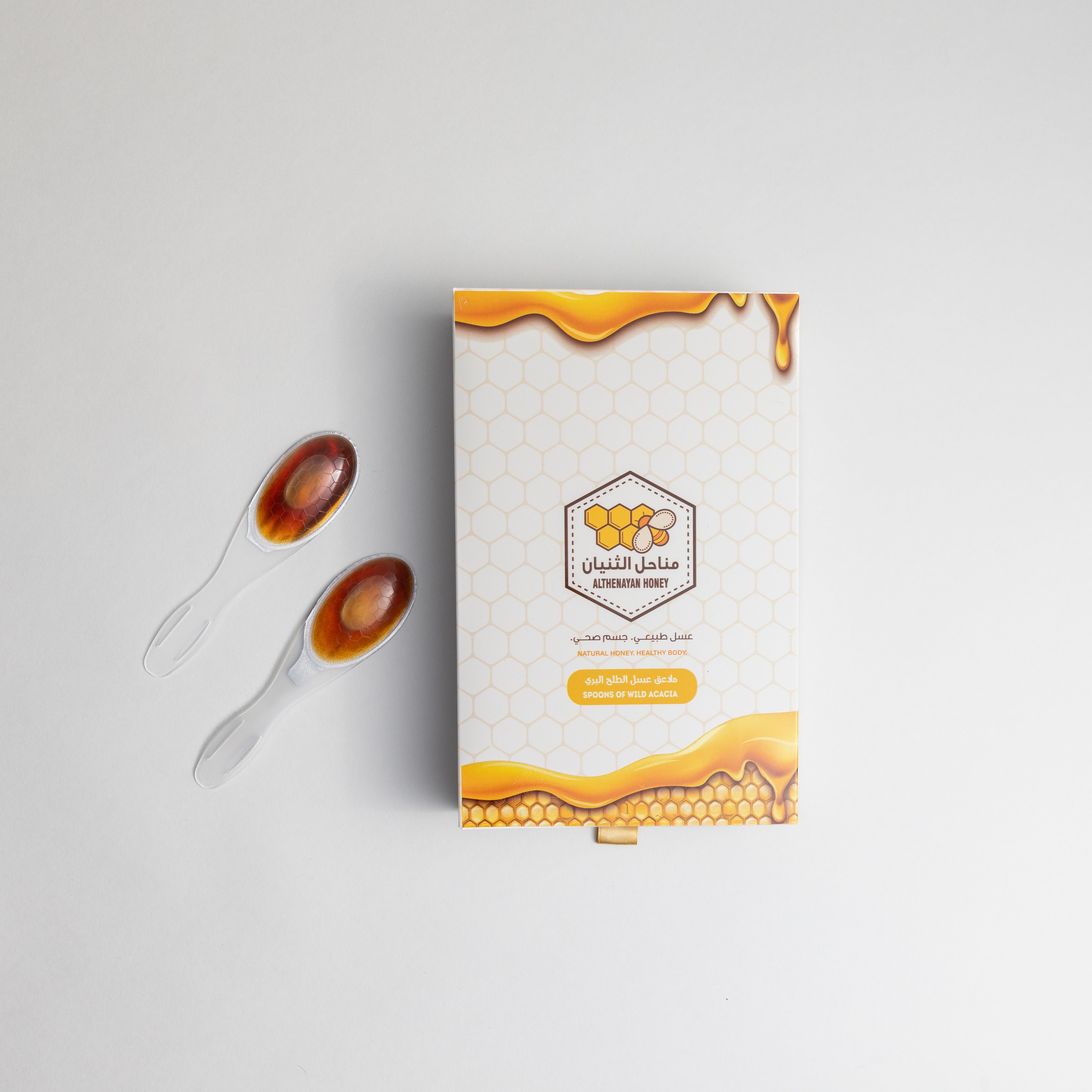 Spoons of wild acacia honey